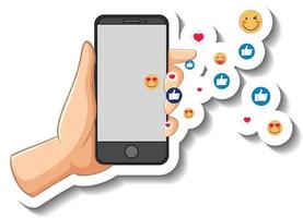 un modèle d'autocollant de main tenant un téléphone intelligent avec une icône emoji sociale vecteur