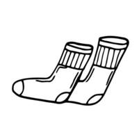 icône de doodle de contour de chaussettes dessinées à la main de vecteur. illustration de croquis de chaussettes pour impression, web, mobile et infographie isolé sur fond blanc. vecteur