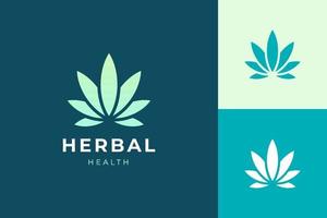 logo à base de plantes ou de santé dans une feuille de cannabis ou de marijuana simple et propre vecteur