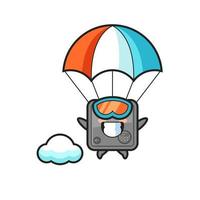 le dessin animé de mascotte de coffre-fort saute en parachute avec un geste heureux vecteur