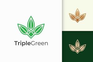 logo triple feuille ou fleur dans un style luxueux pour la santé et la beauté vecteur