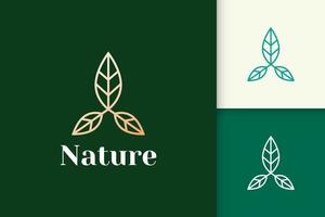 logo de fleur en forme de ligne féminine et de luxe pour la santé et la beauté vecteur