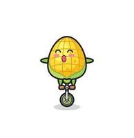 le mignon personnage de maïs fait du vélo de cirque vecteur