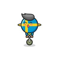 le mignon personnage de l'insigne du drapeau suédois fait du vélo de cirque vecteur