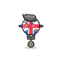 le mignon personnage insigne du drapeau du royaume-uni fait du vélo de cirque vecteur