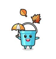 dessin animé du seau en plastique mignon tenant un parapluie en automne vecteur