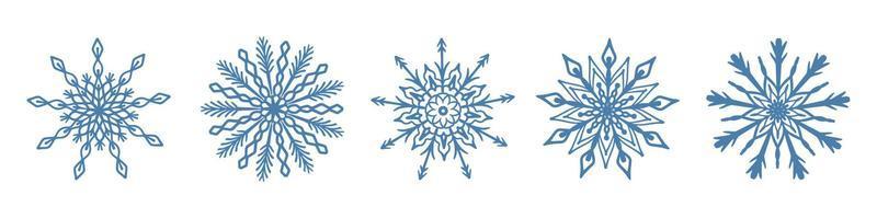 ensemble d'icône de flocon de neige bleu dessiné à la main isolé sur fond blanc. vecteur