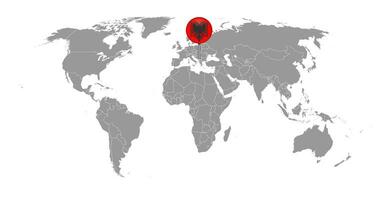 épingler la carte avec le drapeau de l'albanie sur la carte du monde.illustration vectorielle. vecteur