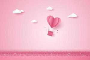 saint valentin, illustration de l'amour, ballons à air chaud coeur rose survolant l'herbe, style art papier vecteur