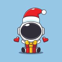 mignonne astronaute avec Noël cadeau. mignonne Noël dessin animé personnage illustration. vecteur