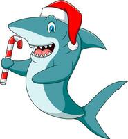 mignonne dessin animé requin dans une Père Noël chapeau en portant bonbons canne vecteur