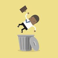 un homme d'affaires africain est tombé dans le concept de licenciement de poubelle. vecteur