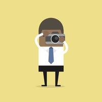 un homme d'affaires africain prend une photo avec un appareil photo. vecteur