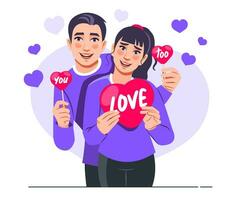 portrait de une mignonne Jeune couple portant violet t-shirts dans l'amour et en portant rouge papier cœur cartes. la Saint-Valentin journée fête vecteur