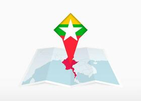 myanmar est représenté sur une plié papier carte et épinglé emplacement marqueur avec drapeau de Birmanie. vecteur