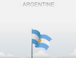 le drapeau argentin flotte sur un poteau qui se dresse sous le ciel blanc vecteur