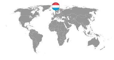 épinglez la carte avec le drapeau luxembourgeois sur la carte du monde. illustration vectorielle. vecteur