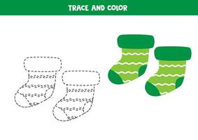 trace et Couleur dessin animé vert chaussettes. feuille de travail pour les enfants. vecteur