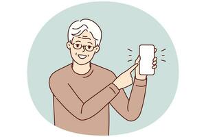 homme âgé souriant dans des verres pointant vers l'écran de téléphone portable maquette. heureux spectacle de grand-père mature avec le doigt sur l'écran du smartphone. illustration vectorielle. vecteur