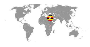 épinglez la carte avec le drapeau de l'ouganda sur la carte du monde. illustration vectorielle. vecteur