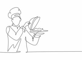 dessin d'une seule ligne d'un jeune chef masculin séduisant servant une cuisine délicieuse au restaurant. tenant et ouvrant le plateau cloche modèle moderne une ligne dessinés à la main illustration vectorielle style minimalisme vecteur