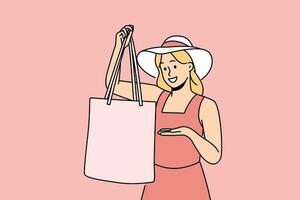 femme détient textile sac recommander à refuser Plastique jetable paquets pour achats. à la mode fille dans Chapeaux démontre chiffon sac pour confortable visite à supermarché et se soucier pour la nature. vecteur