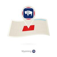 plié papier carte de Wyoming nous Etat avec drapeau épingle de Wyoming. vecteur