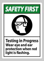 Test des premiers signes de sécurité en cours, portez une protection oculaire et auditive lorsque le voyant rouge clignote vecteur