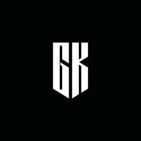 monogramme du logo gk avec style emblème isolé sur fond noir vecteur