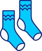 paire de chaussettes bleu rempli icône vecteur