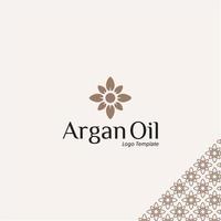 logo de l'huile d'arganvector modèle de conception d'emballage et emblème, beauté et cosmétiques, logo dans le logo de feuille de graine d'huile d'argan de style linéaire tendance