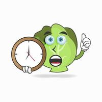 personnage de mascotte de chou tenant une horloge murale. illustration vectorielle vecteur