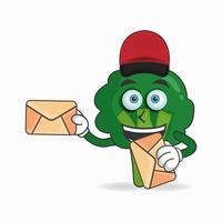 le personnage mascotte brocoli devient livreur de courrier. illustration vectorielle vecteur