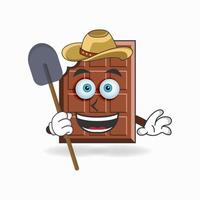 le personnage mascotte chocolat devient agriculteur. illustration vectorielle vecteur