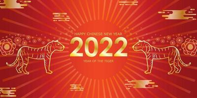 deux tigres dorés sur fond dégradé, avec inscription 2022 et joyeux nouvel an chinois vecteur
