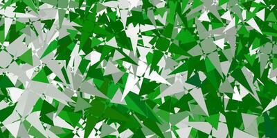 fond de vecteur vert clair avec des formes polygonales.