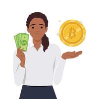 Jeune femme tenir bitcoin pièce de monnaie signe dans main et dollar argent. la personne avec bitcoins, crypto devise pièce de monnaie. plat vecteur