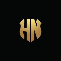 monogramme du logo hn avec des couleurs dorées et un modèle de conception de forme de bouclier vecteur