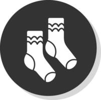 paire de chaussettes glyphe gris cercle icône vecteur