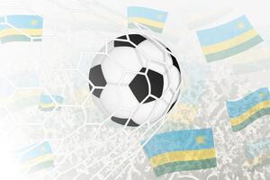 nationale Football équipe de Rwanda marqué but. Balle dans objectif filet, tandis que Football partisans sont agitant le Rwanda drapeau dans le Contexte. vecteur