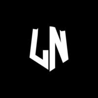 Ruban de logo de lettre monogramme ln avec style de bouclier isolé sur fond noir vecteur