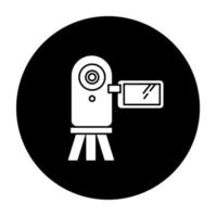 icône de glyphe de caméra vidéo. gadget d'enregistrement numérique. film électronique. tournage, tournage. caméscope portatif. appareil mobile de poche. Vector illustration silhouette blanche en cercle noir