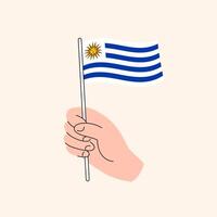 dessin animé main en portant uruguayen drapeau, isolé conception. vecteur