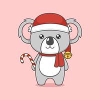 Koala de noël dessin animé mignon avec canne en bonbon vecteur