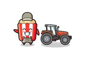 la mascotte du fermier de pop-corn debout à côté d'un tracteur vecteur