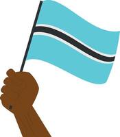main en portant et élevage le nationale drapeau de le botswana vecteur