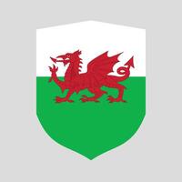 Pays de Galles drapeau dans bouclier forme Cadre vecteur