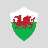 Pays de Galles drapeau dans bouclier forme Cadre vecteur