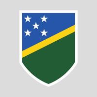 Salomon îles drapeau dans bouclier forme vecteur