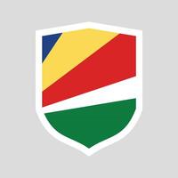 les Seychelles drapeau dans bouclier forme Cadre vecteur